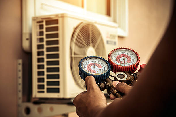 Professional Hvac technician working in Semmes, AL
